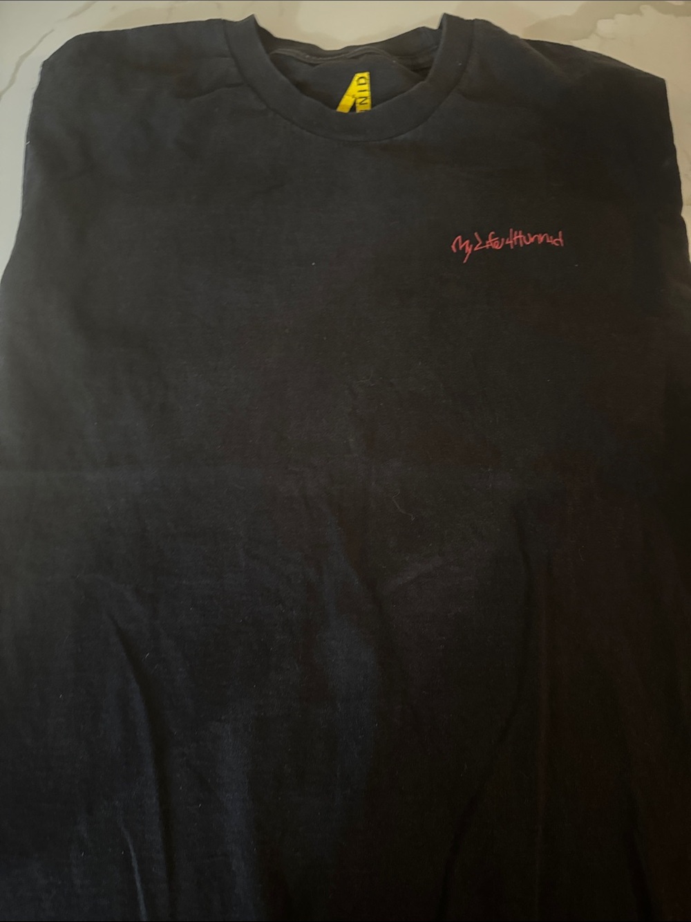 Black Tee with Small Red Script Logo
